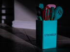 Kitchen utensils in a holder